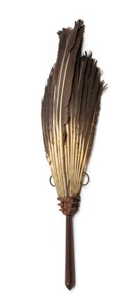 A Chinese Carved Hongmu Feathered Fan Length 19 inches. — QING DYNASTY (1644-1912)