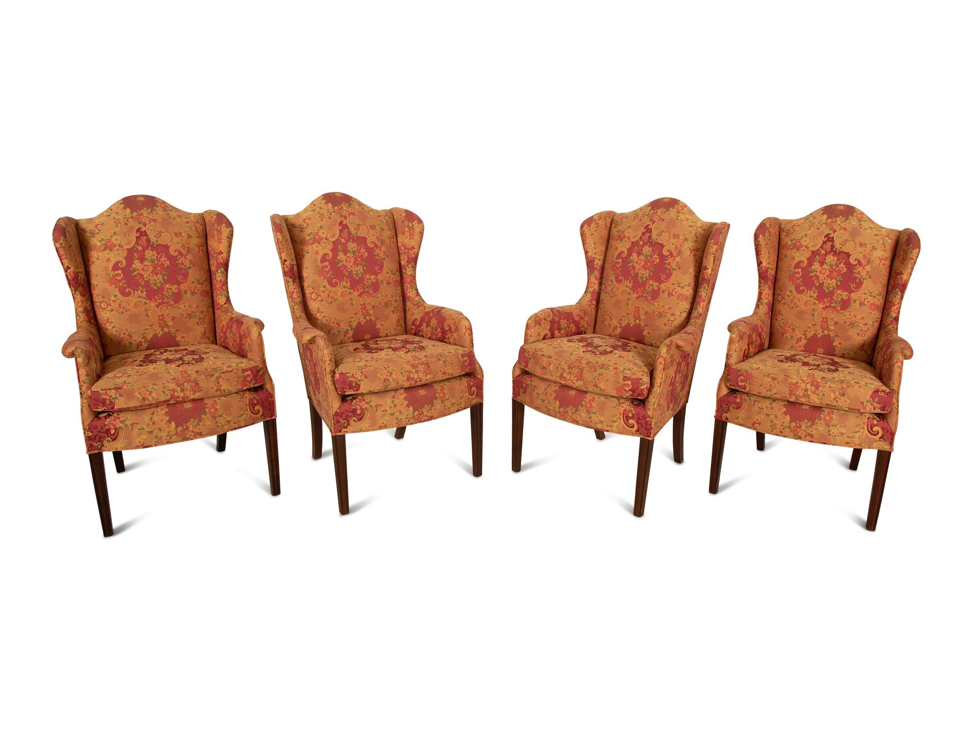 A Set of Seven George III Style Mahogany Wing Back Armchairs