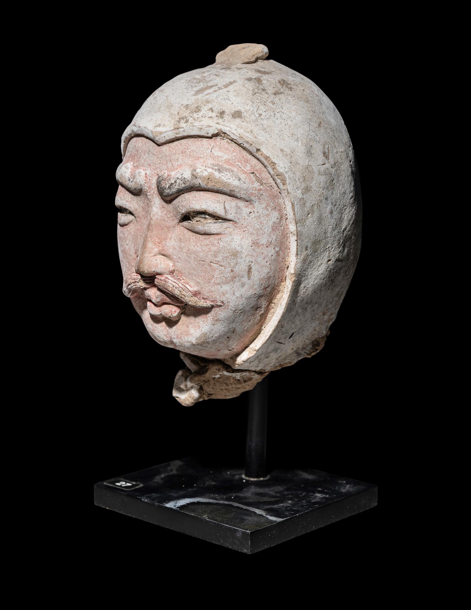 A Chinese Painted Potter Head of a Warrior