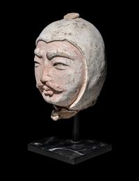 A Chinese Painted Potter Head of a Warrior