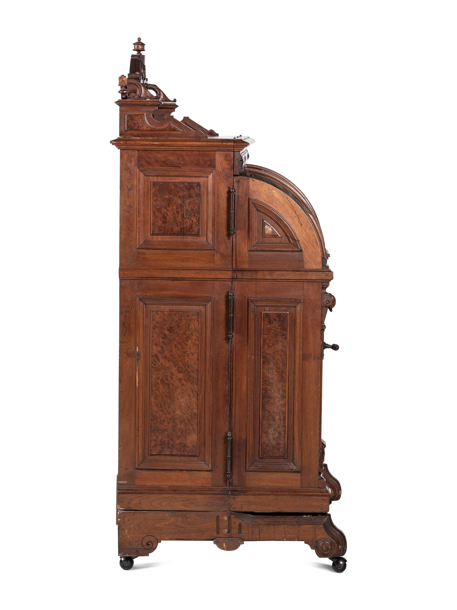 A Renaissance Revival Carved and Burl Walnut Wooton Desk