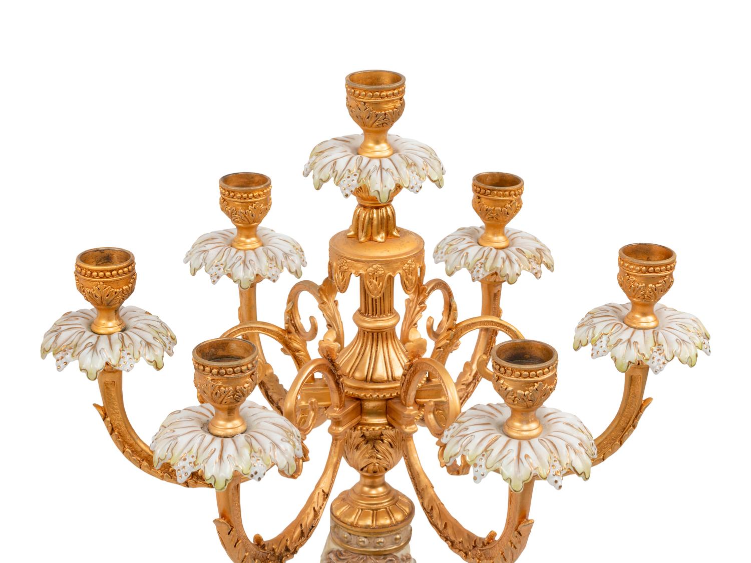 A Pair of German Porcelain and Gilt Bronze Figural Seven-Light Candelabra