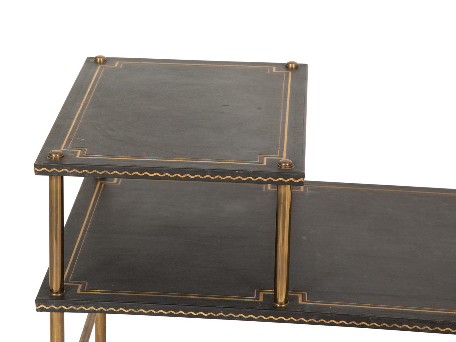 A Pair of Brass and Leather Two-Tier Side Tables