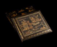A Chinese Export Gilt and Red Highlighted Black Lacquered Box and Cover