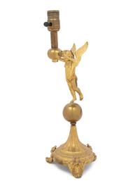 A Continental Gilt Metal Figural Lamp