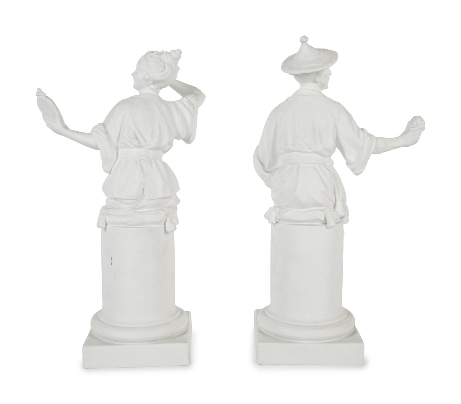 A Pair of Royal Worcester Porcelain Chinoiserie Figures