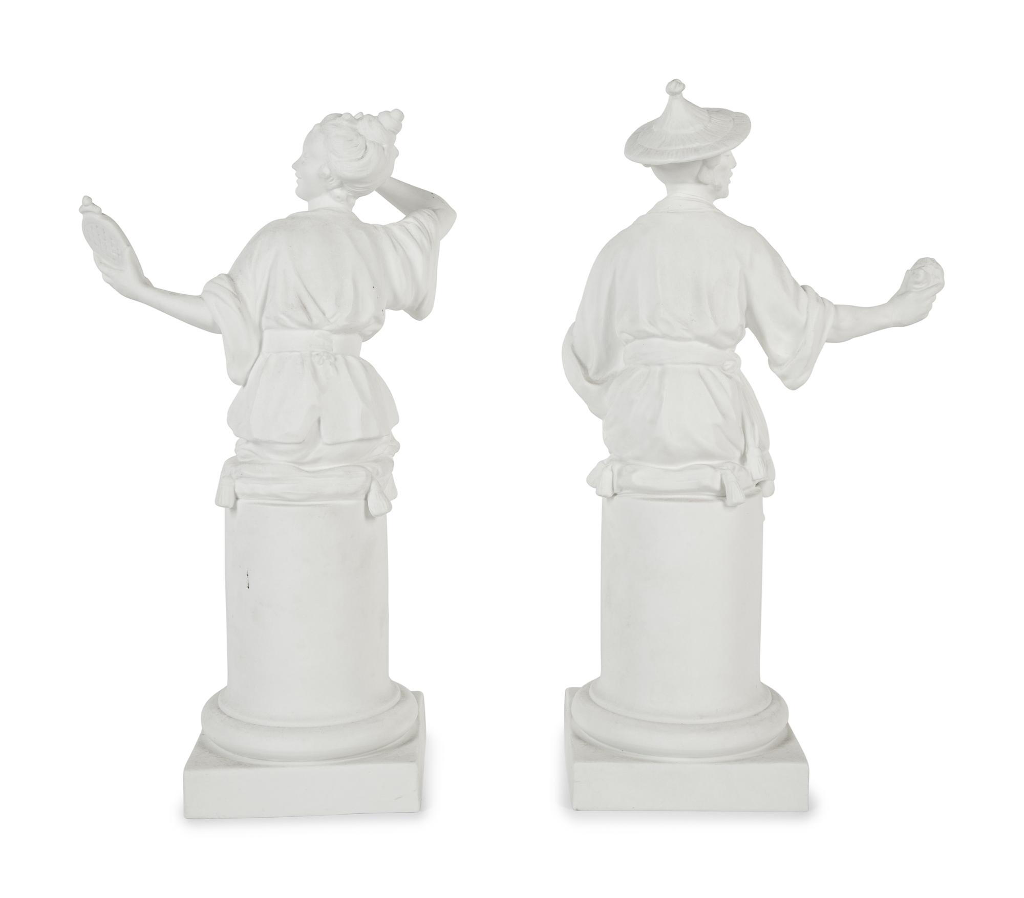A Pair of Royal Worcester Porcelain Chinoiserie Figures