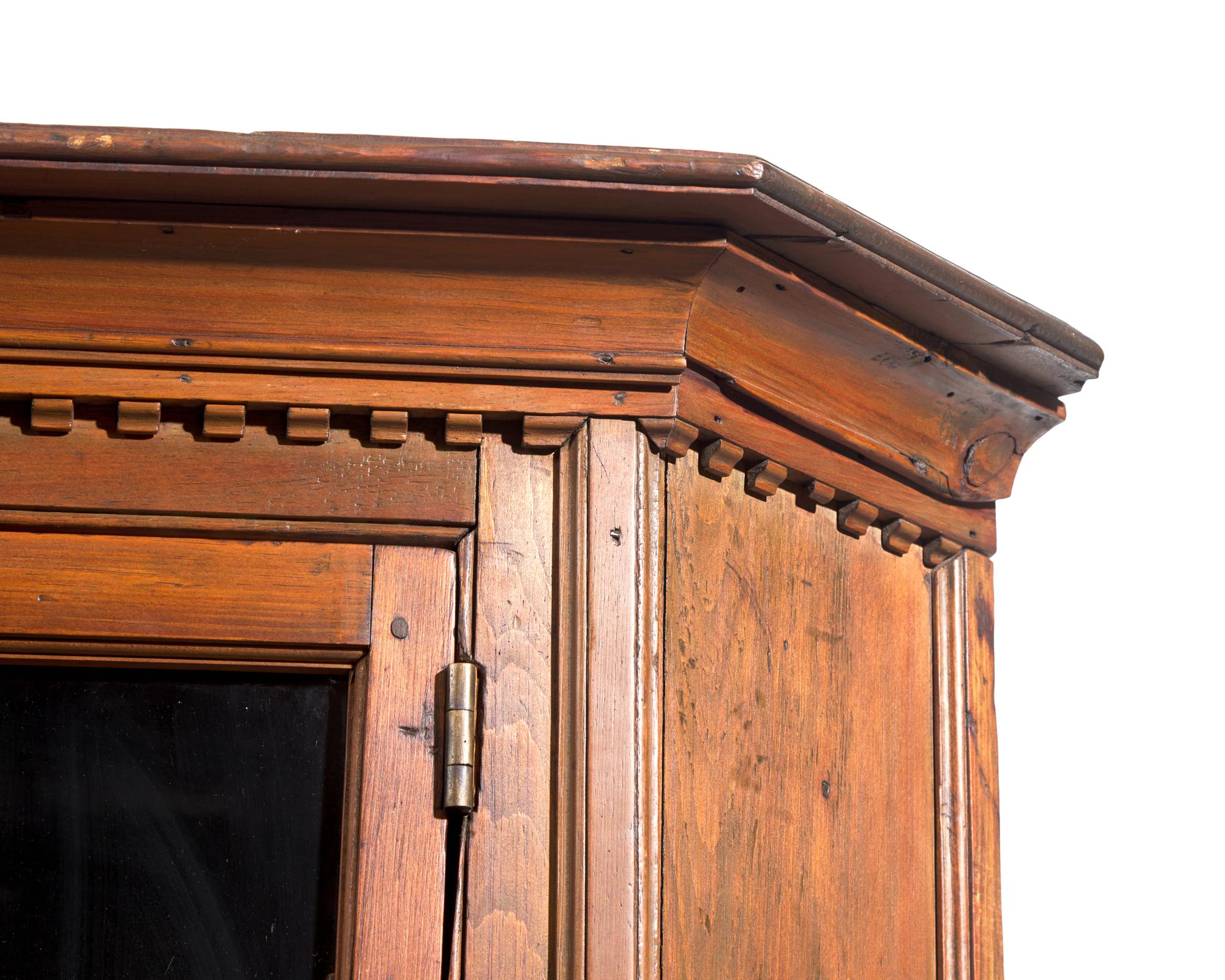 A Chippendale Pine Corner Cupboard