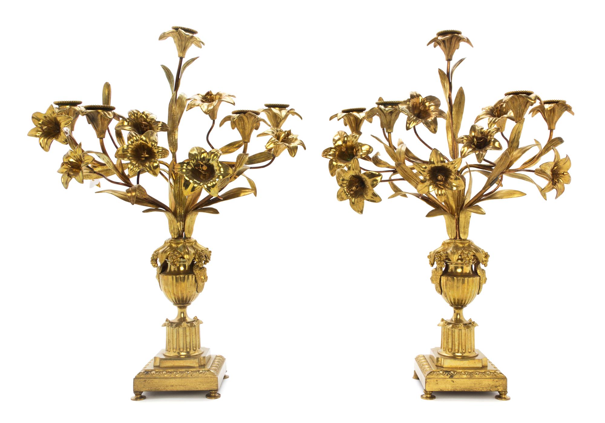 A Pair of Victorian Gilt Metal Five-Light Candelabra, Height 20 inches.