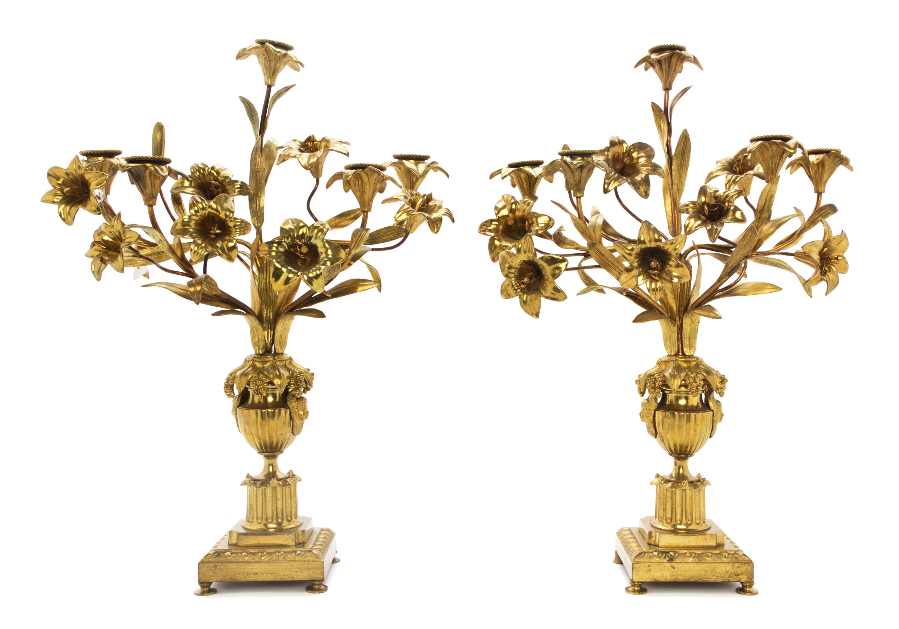 A Pair of Victorian Gilt Metal Five-Light Candelabra, Height 20 inches.