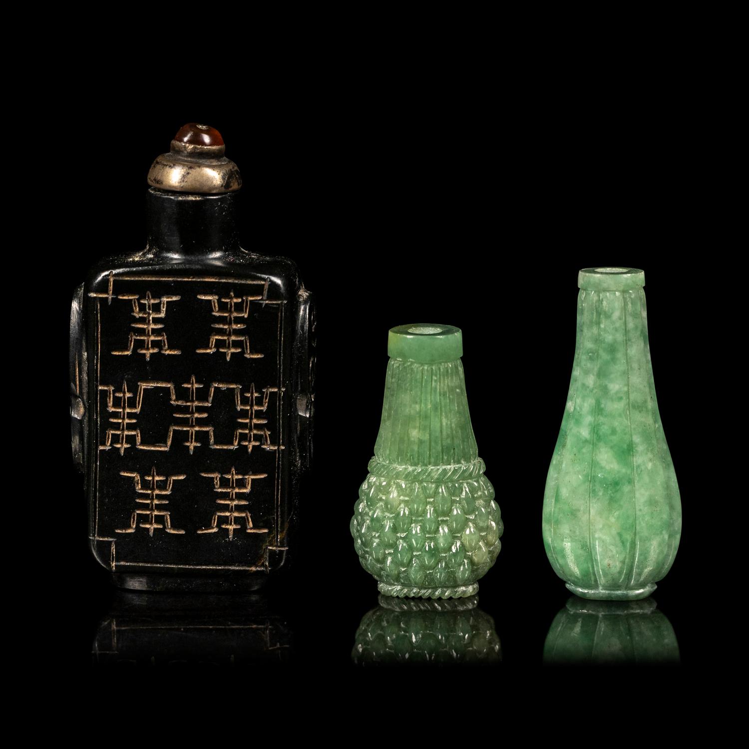 Three Chinese Hardstone Snuff Bottles
