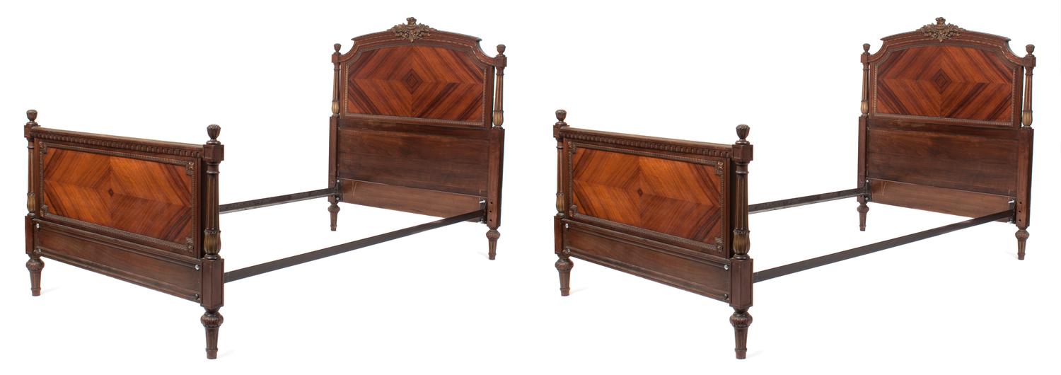 A Pair of Louis XVI Style Bookmatch Veneered Beds Height 48 x width 42 1/2 x depth 81 inches. — 20TH CENTURY