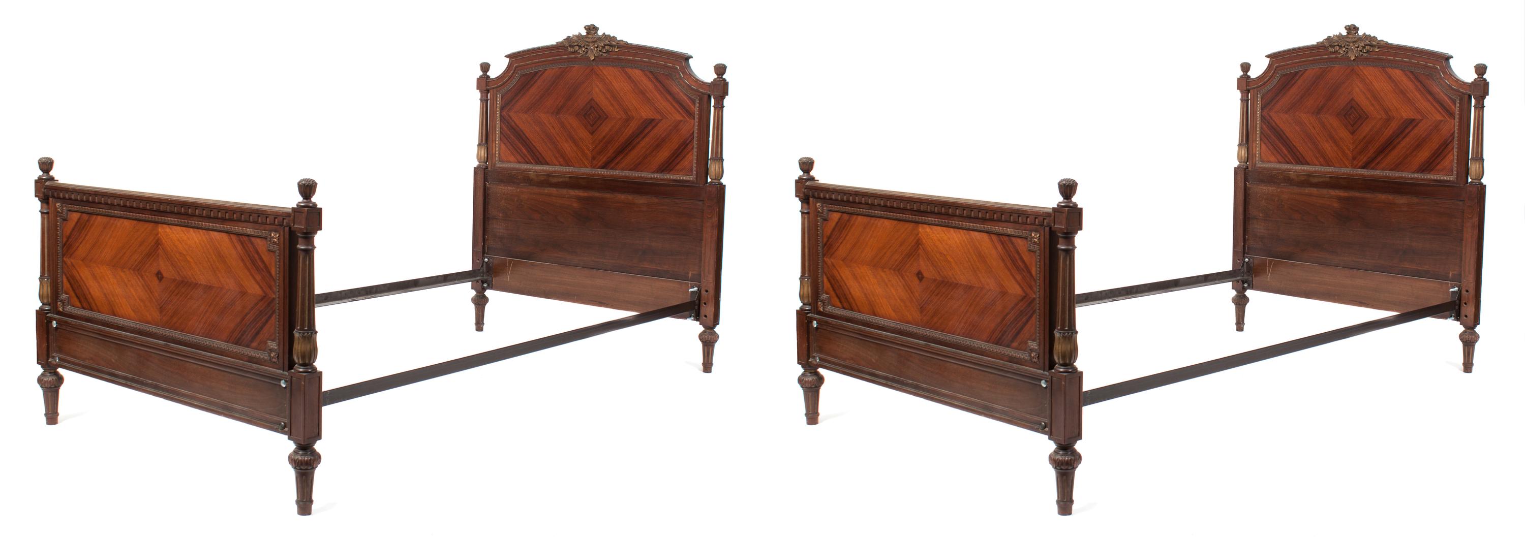 A Pair of Louis XVI Style Bookmatch Veneered Beds Height 48 x width 42 1/2 x depth 81 inches. — 20TH CENTURY
