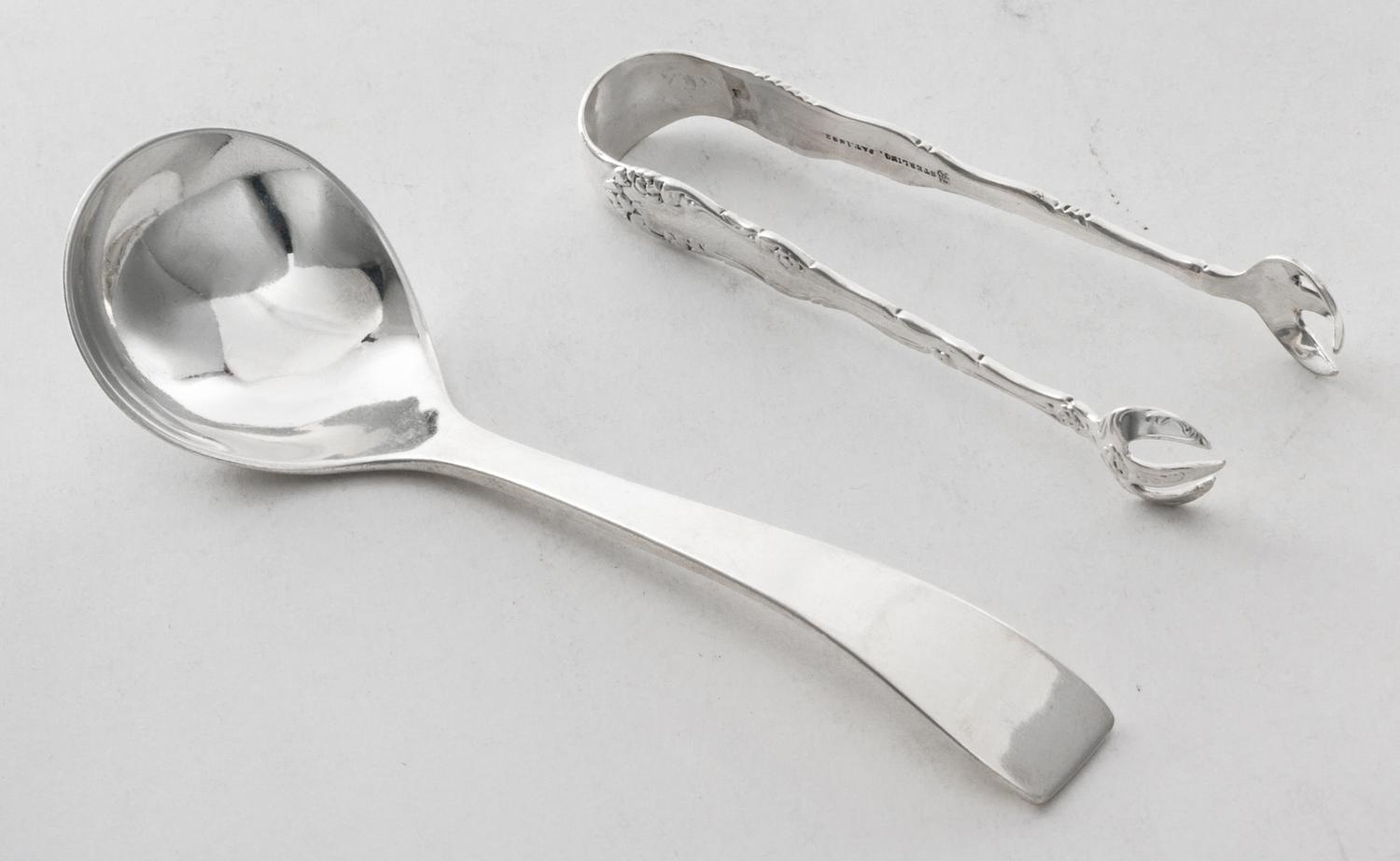 Two American Silver Articles, , comprising a cream ladle, Portland Blanchard, Burbank, CA and sugar tongs, Towle Silversmiths, Newburyp