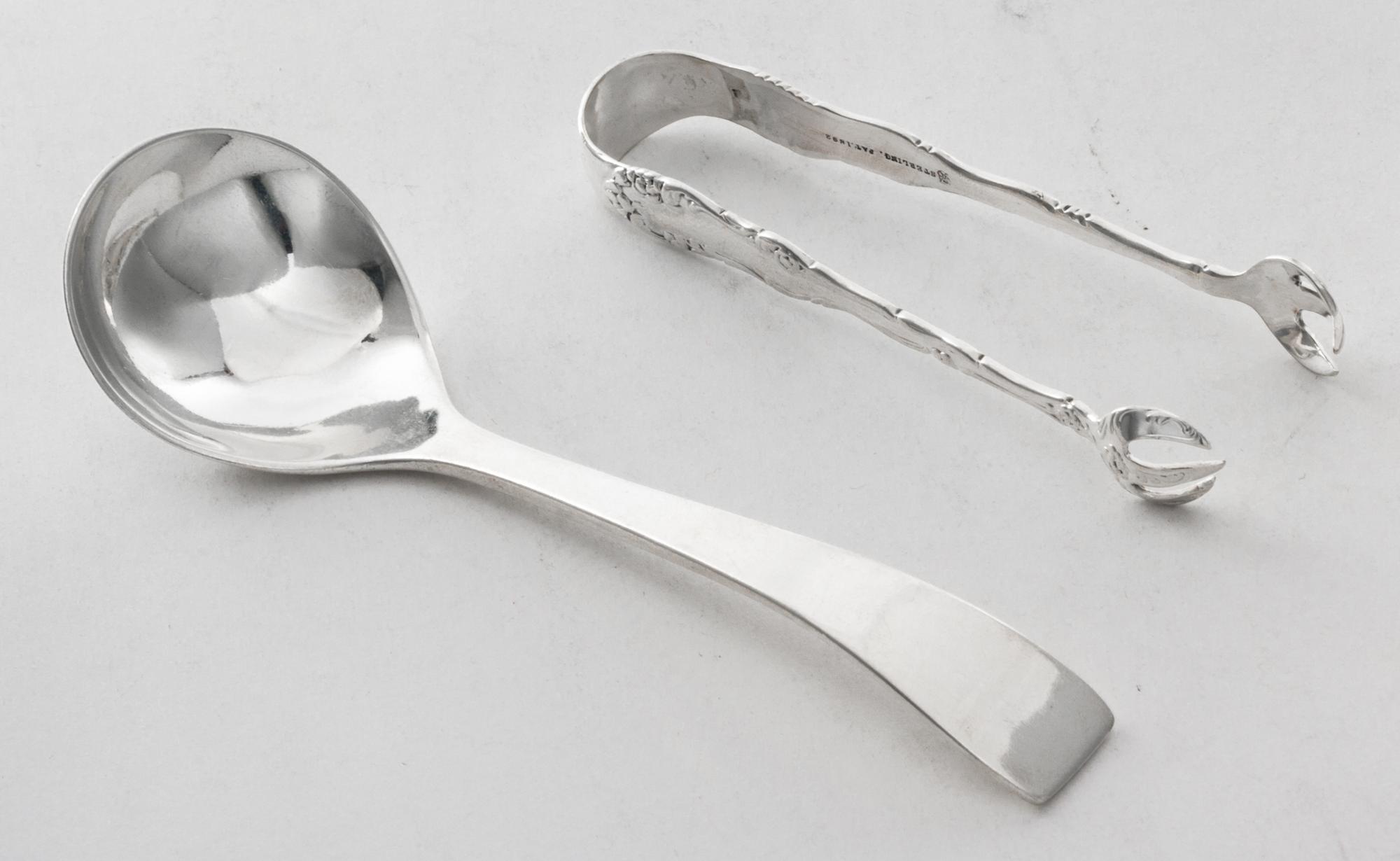 Two American Silver Articles, , comprising a cream ladle, Portland Blanchard, Burbank, CA and sugar tongs, Towle Silversmiths, Newburyp