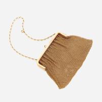 A fourteen karat gold mesh purse