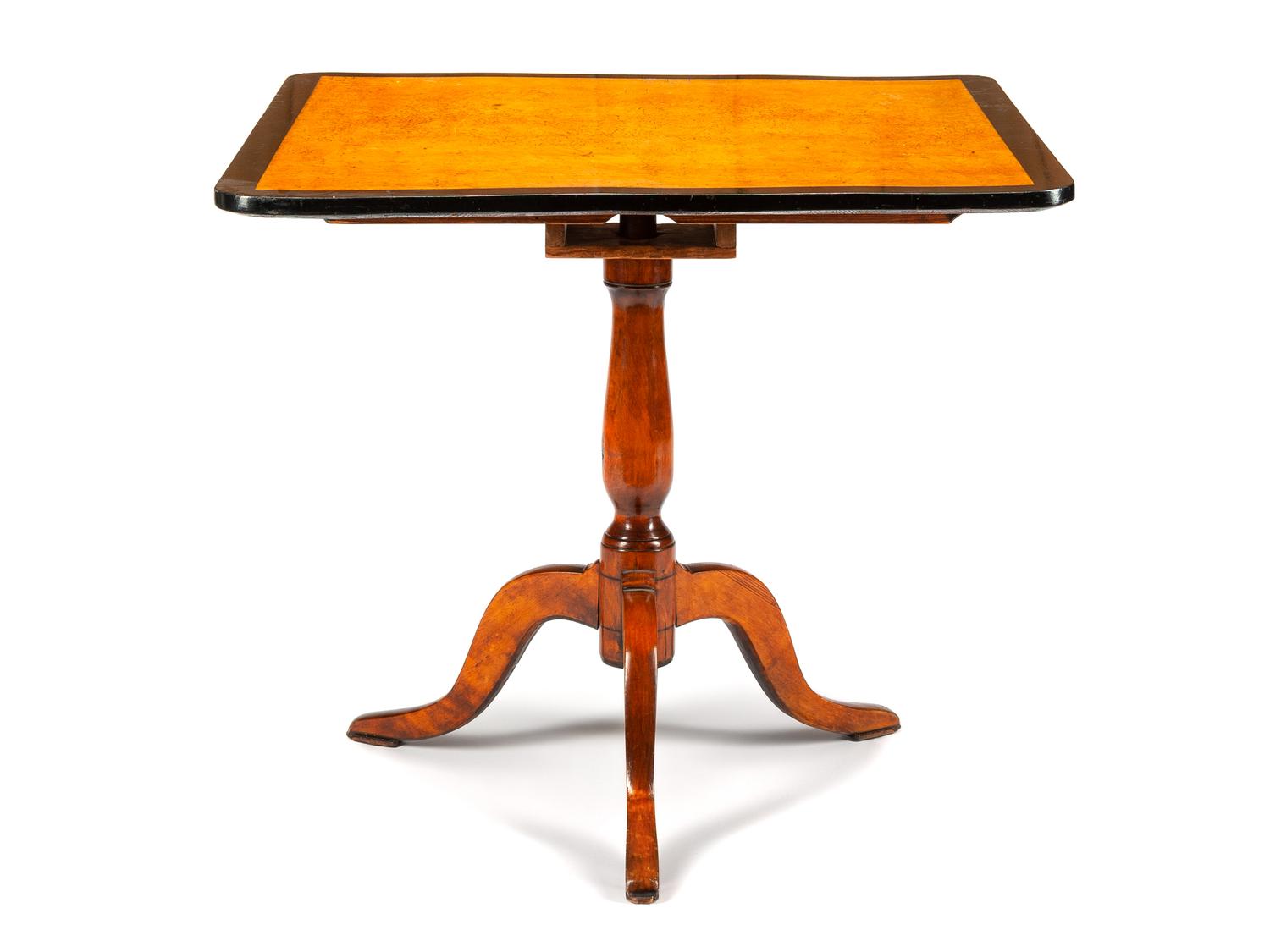 A Biedermeier Style Parcel Ebonized Table
