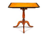A Biedermeier Style Parcel Ebonized Table