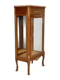 A Louis XV/XVI Transitional Style Gilt-Metal Mounted Mahogany Marble-Top Vitrine Cabinet