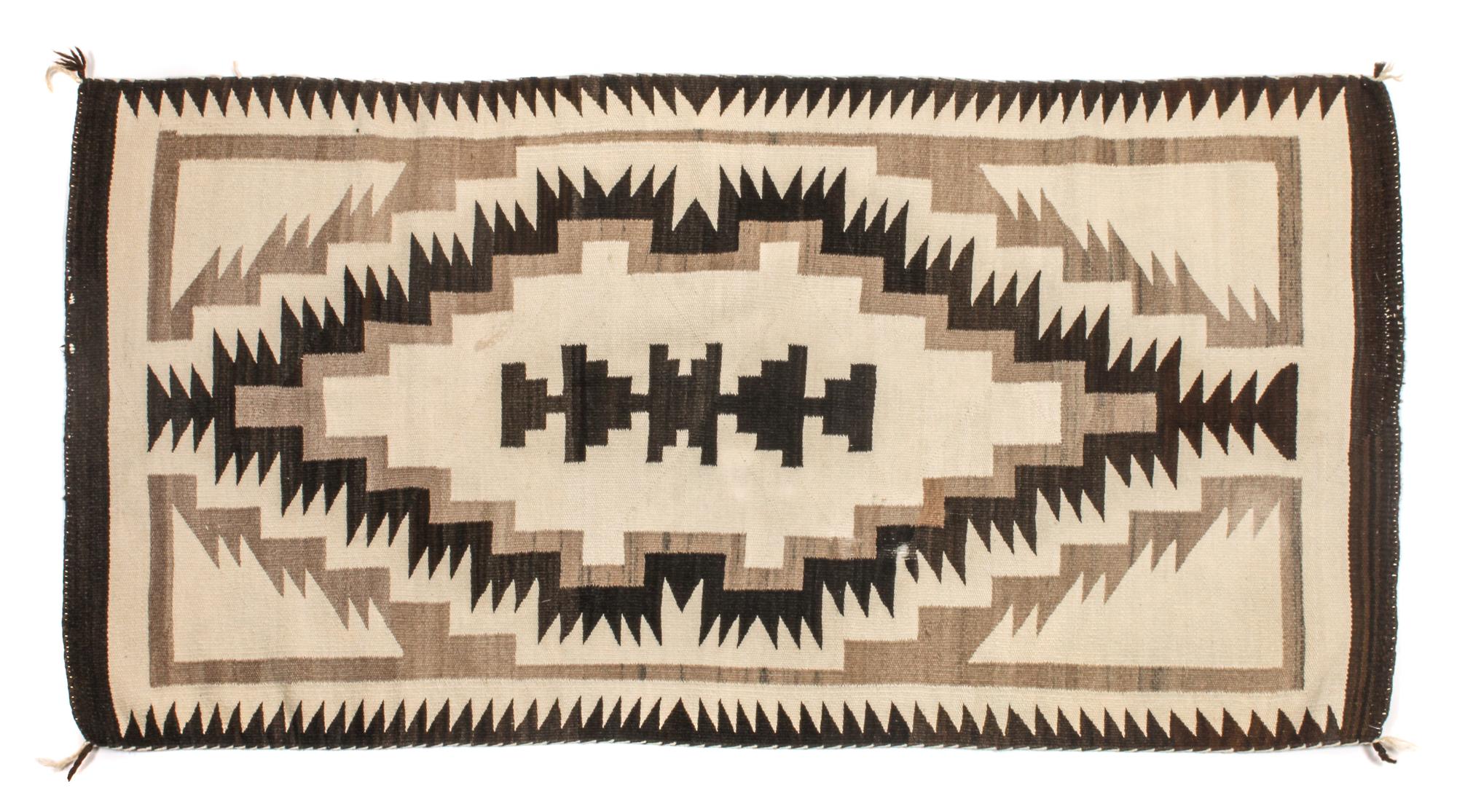 Three Navajo Rugs Largest: 36 x 68 inches