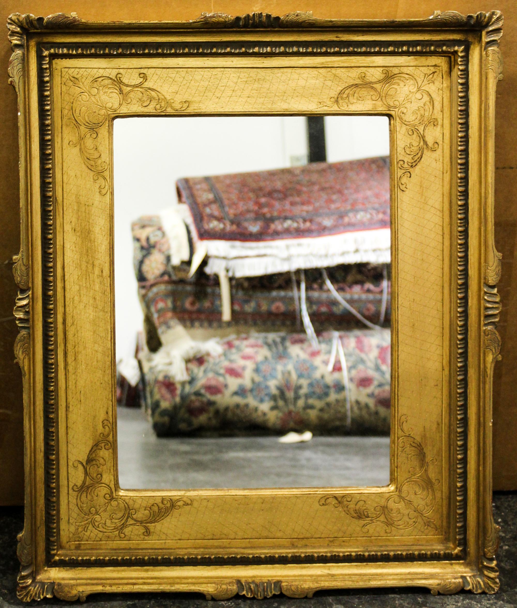 An Italian Giltwood Mirror Height 23 1/2 x width 19 5/8 inches. — EARLY 20TH CENTURY