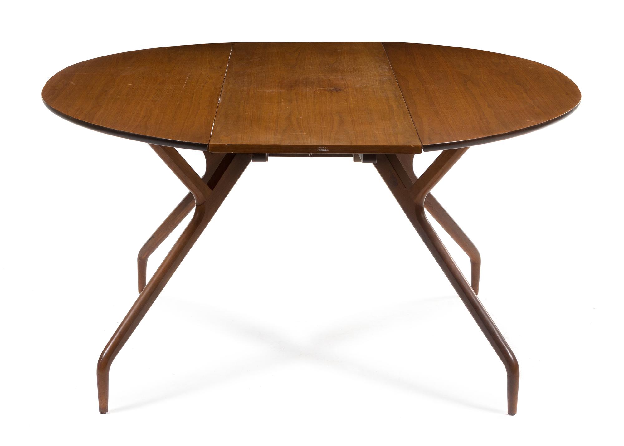 A Drop Leaf Table, Greta Magnusson Grossman for Glenn of California Height 28 1/2 x width 60 x depth 18 inches (closed).