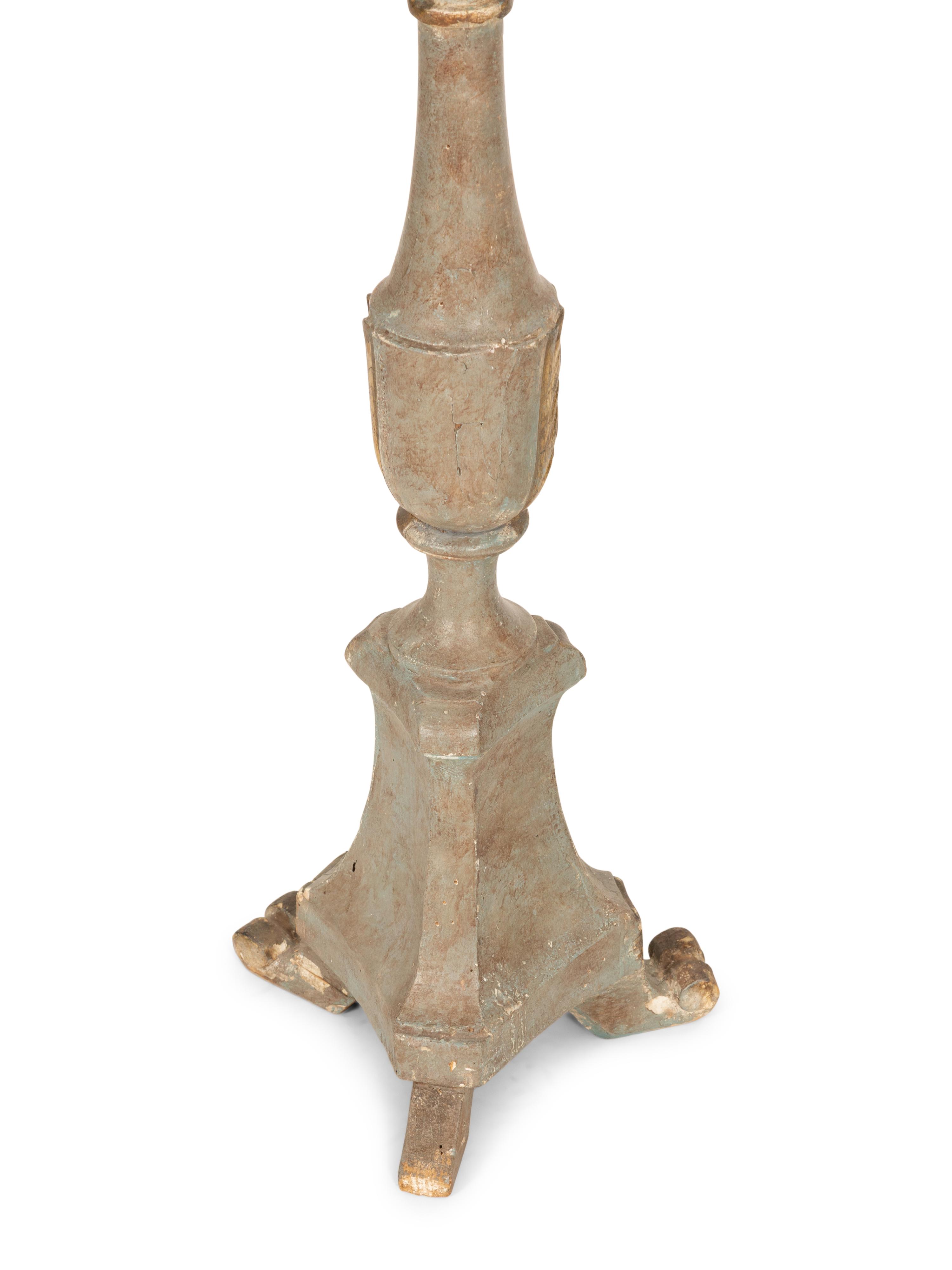 A Pair of Italian Green Painted and Parcel Gilt Pricket Sticks Now Mounted as Lamps