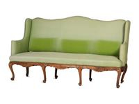 A French Provincial Carved Fruitwood Upholstered High-Back Sofa