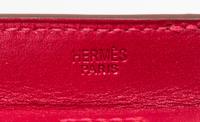 An Hermes Rouge Leather Passport Pouch, 7" x 8" x 1".