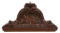 A Continental Carved Mahogany Wall Mount Height 13 1/2 x width 26 inches. — 20TH CENTURY
