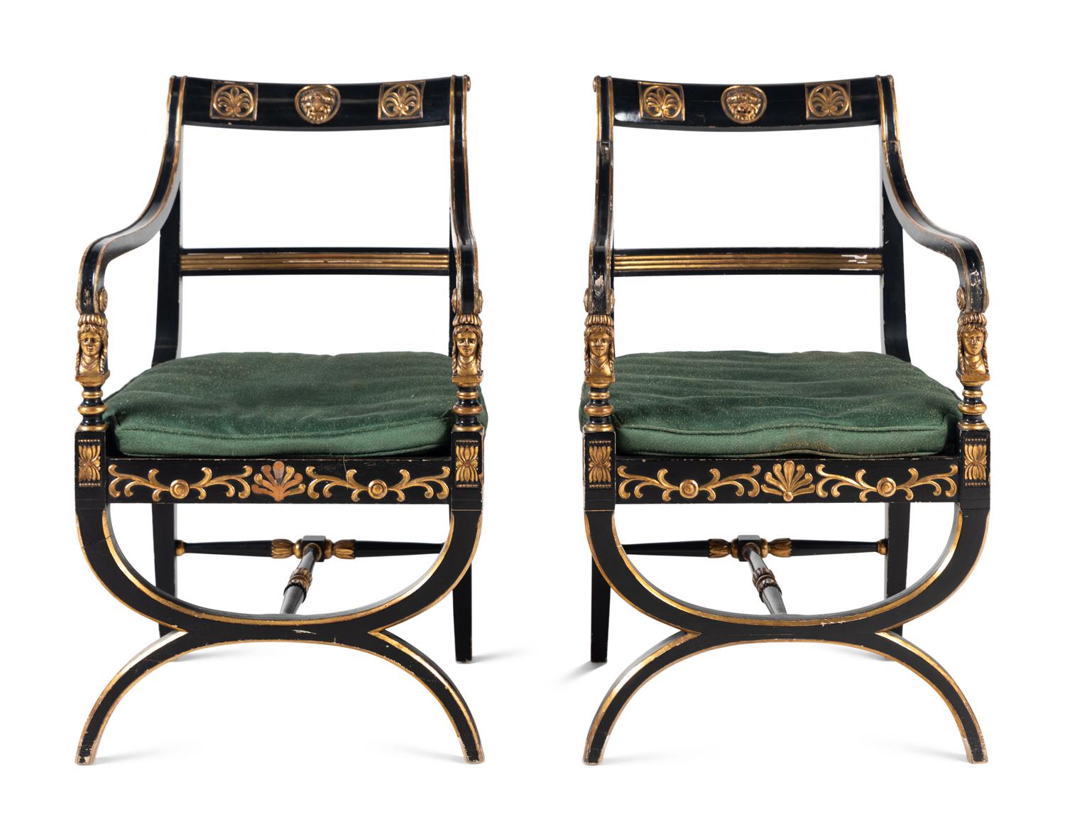 A Pair of Empire Style Ebonized and Parcel Gilt Curule Form Armchairs