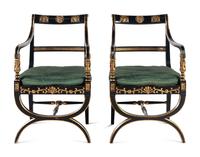 A Pair of Empire Style Ebonized and Parcel Gilt Curule Form Armchairs