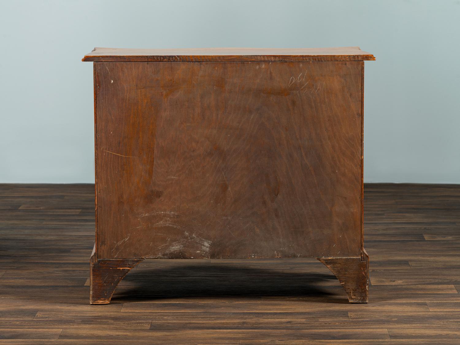 A Chippendale Style Tiger Maple Serpentine Chest of Drawers
