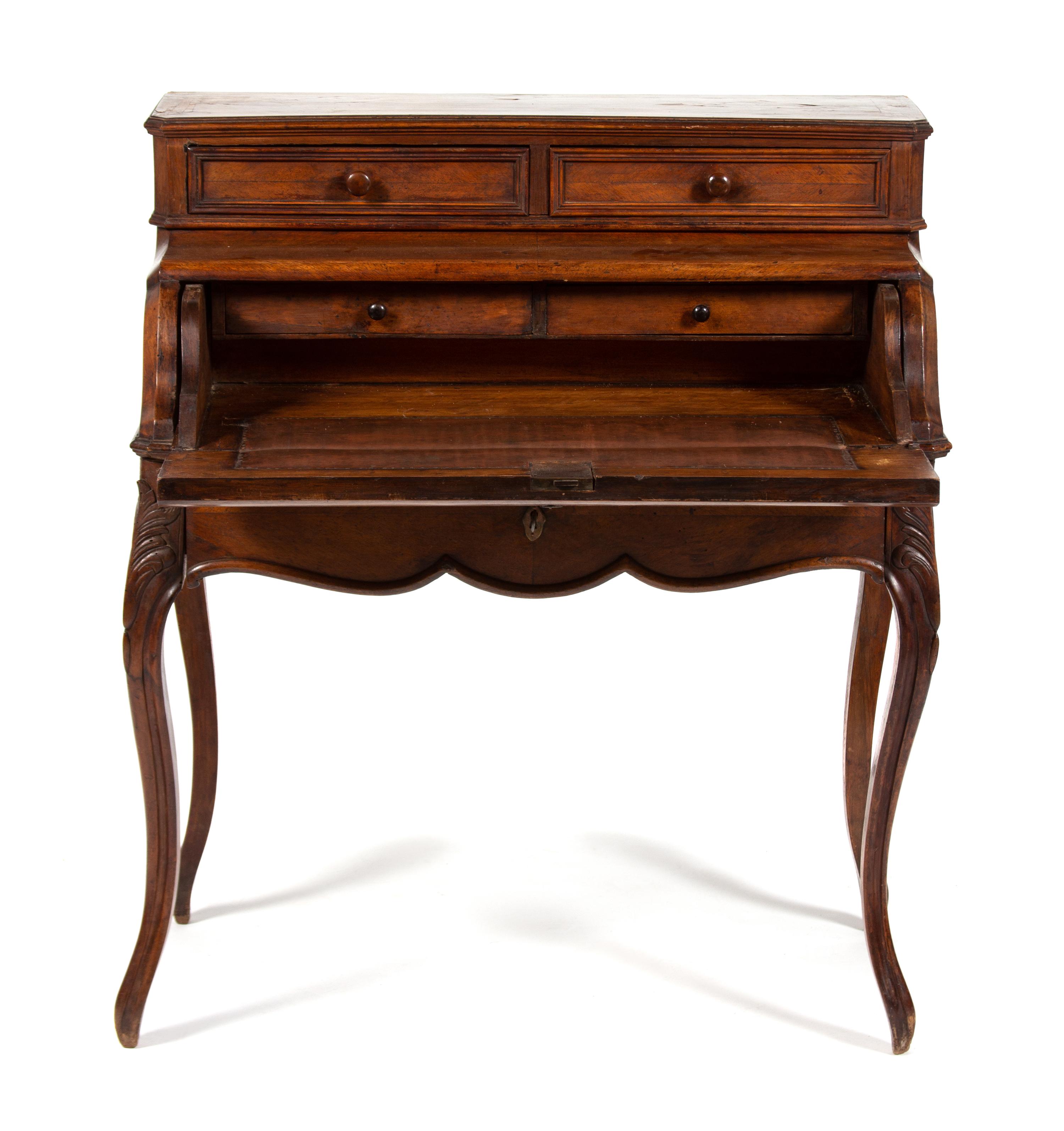 A French Provincial Fruitwood Desk Heigh 41 1/2 x width 34 1/2 x depth 19 1/2 inches. — 19TH CENTURY