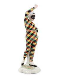 A German Porcelain Harlequin Figure