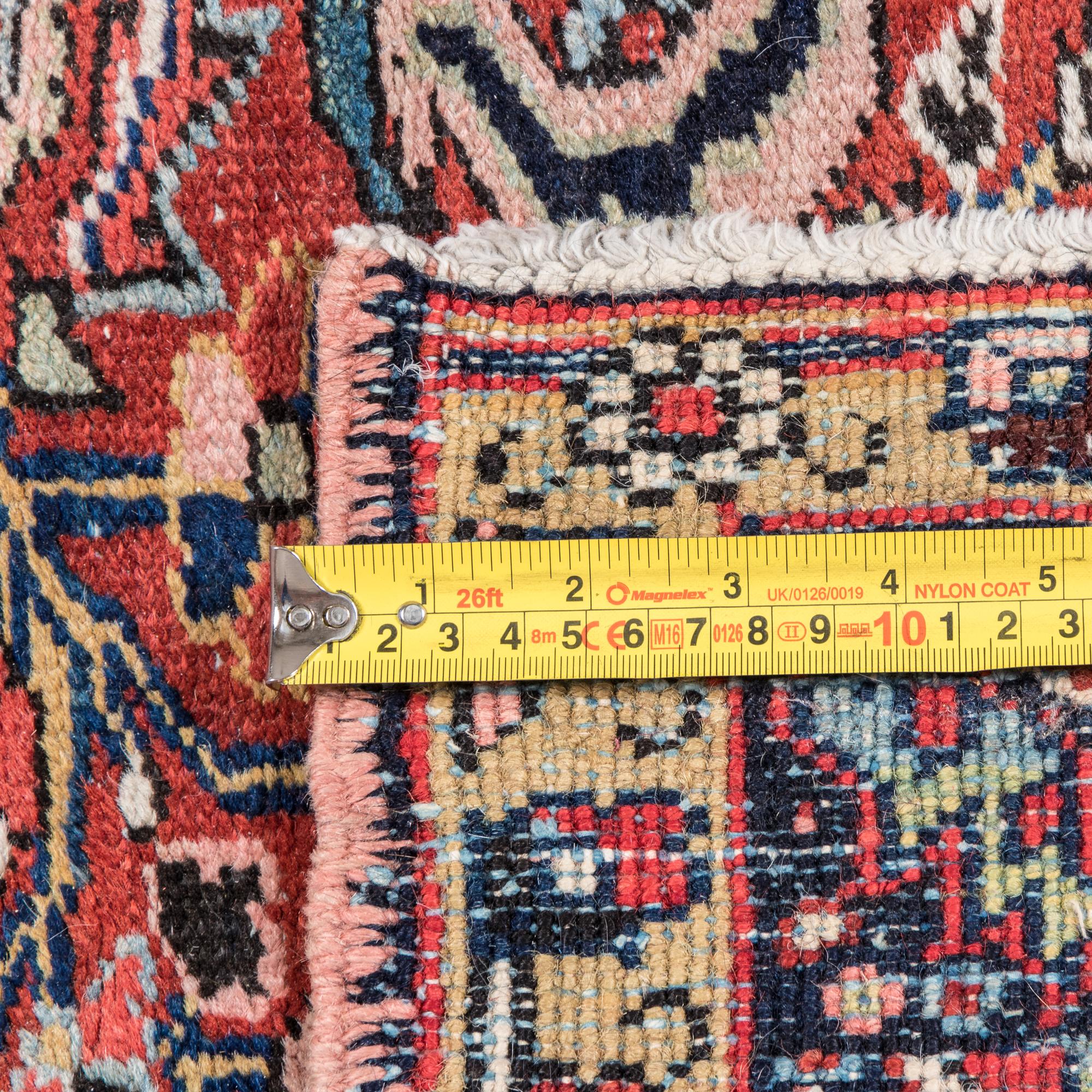 A Heriz Wool Rug