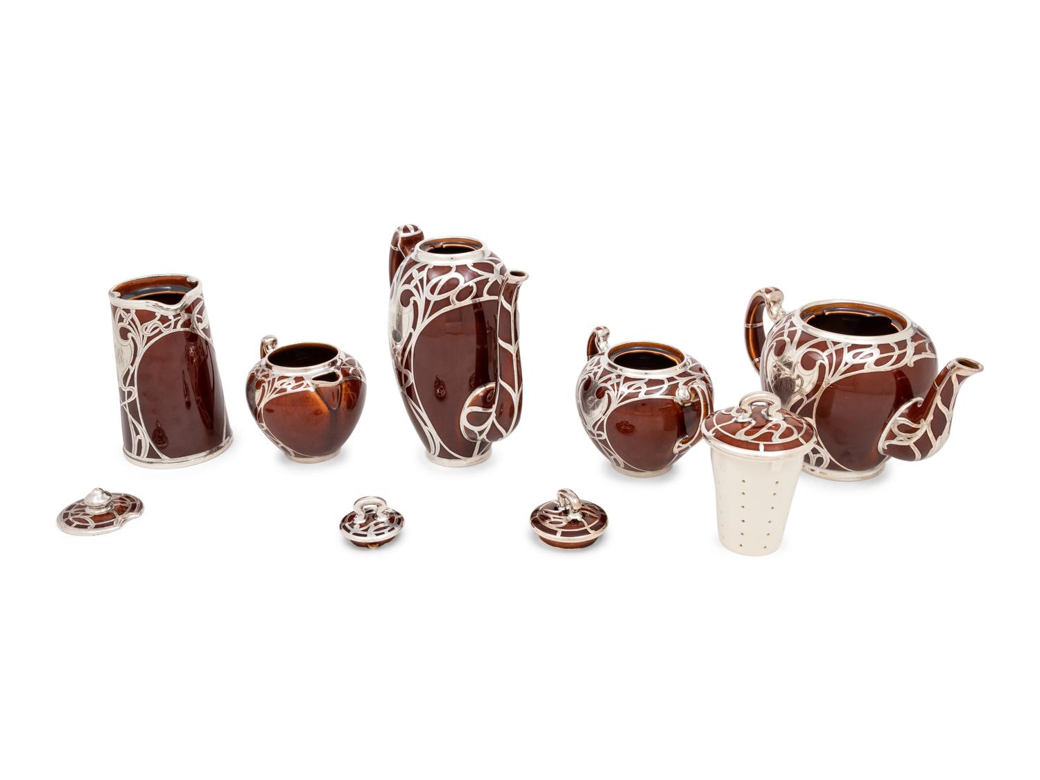 An American Silver Overaly Porcelain Five-Piece Tea and Coffee Service