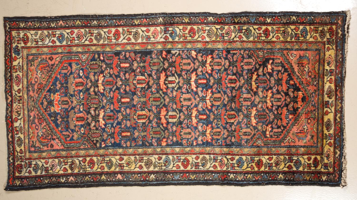 A Northwest Persian Runner 6 feet 3 inches x 3 feet 2 inches.