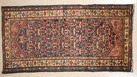 A Northwest Persian Runner 6 feet 3 inches x 3 feet 2 inches.