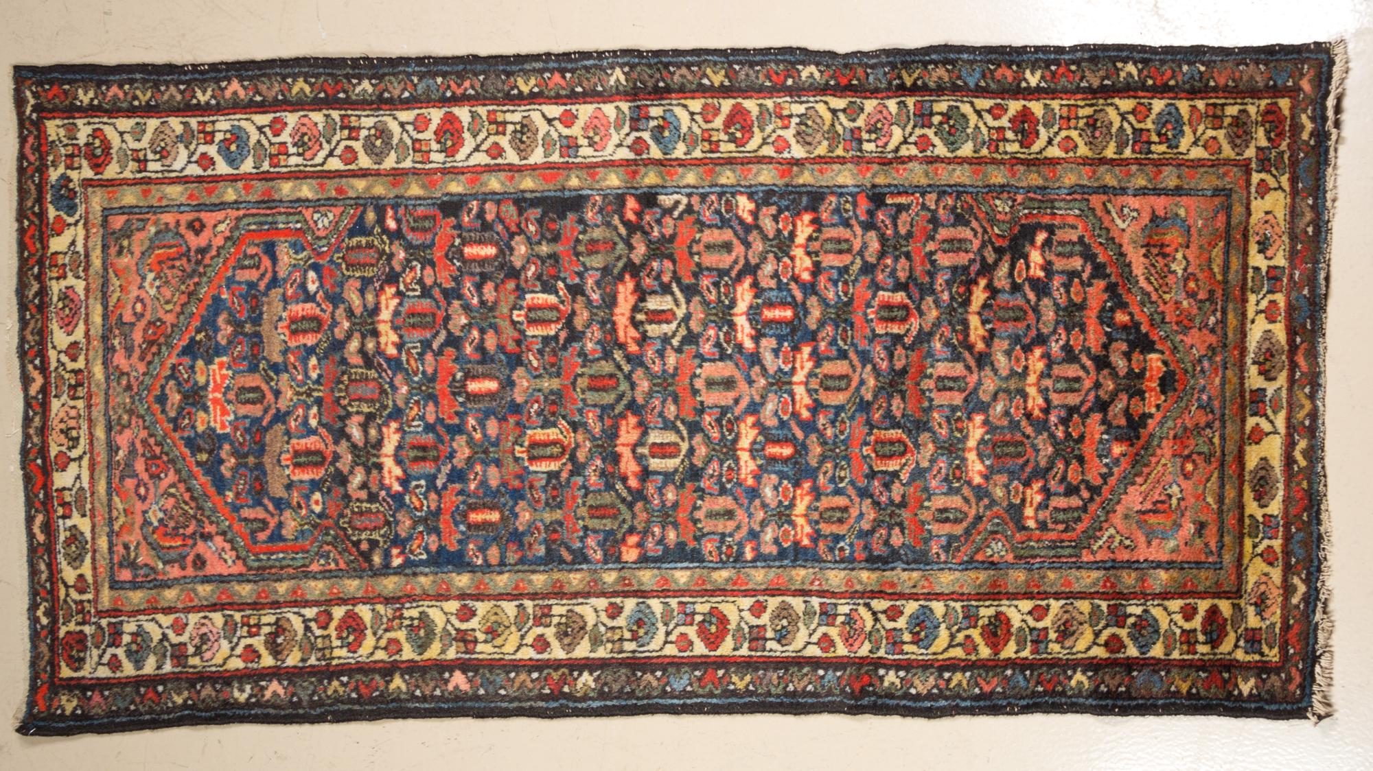 A Northwest Persian Runner 6 feet 3 inches x 3 feet 2 inches.