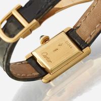 An eighteen karat gold strap wristwatch, Cartier Paris, Tank
