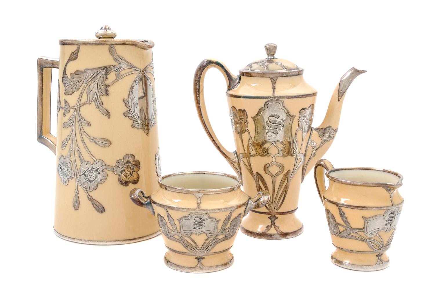 A Lenox Silver Overlay Tea Service Height of covered pitcher 7 3/8 inches.
