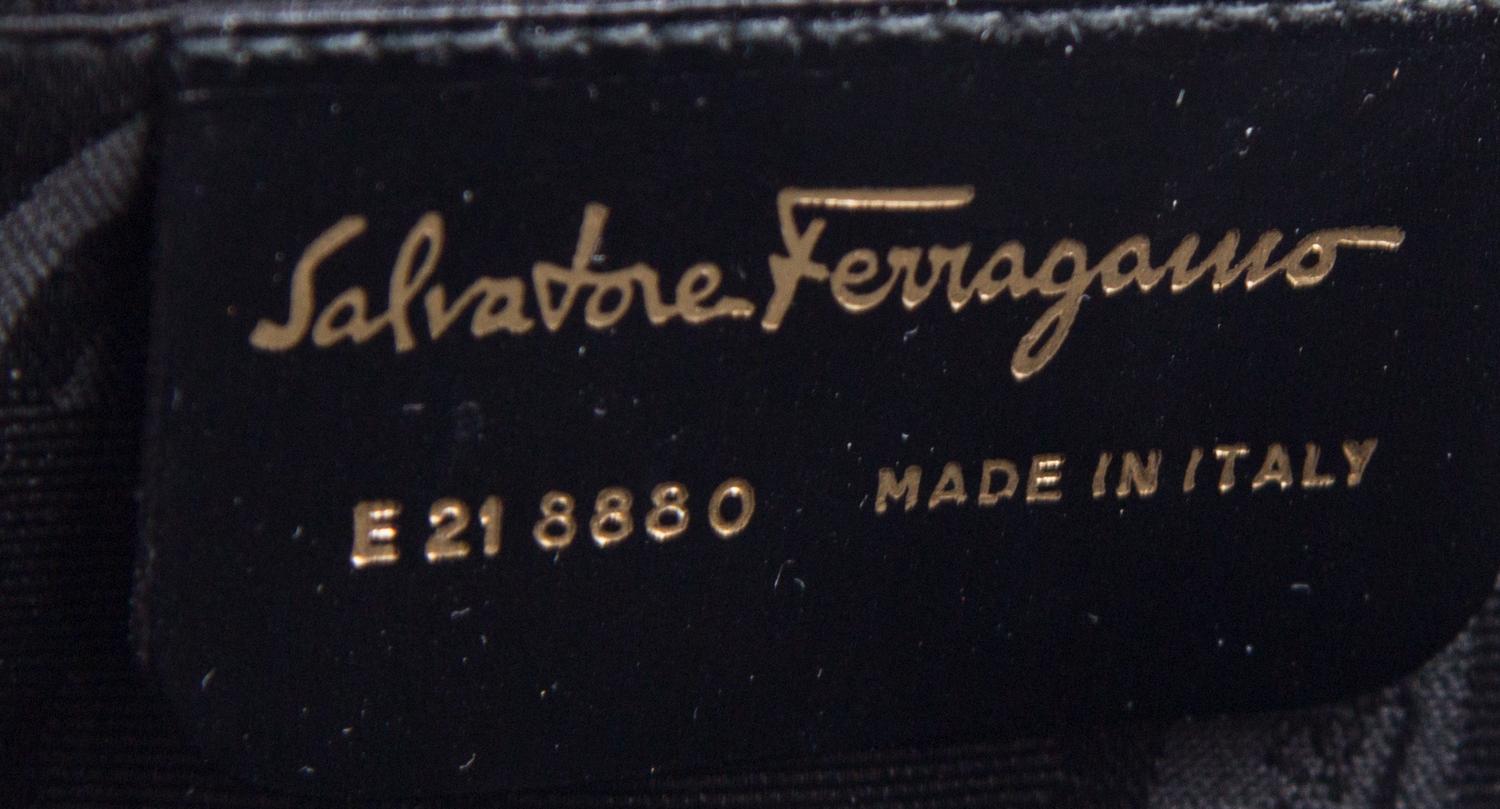 A Ferragamo Brown Leather Embossed Handbag, 10" x 9" x 3".