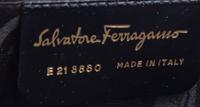 A Ferragamo Brown Leather Embossed Handbag, 10" x 9" x 3".
