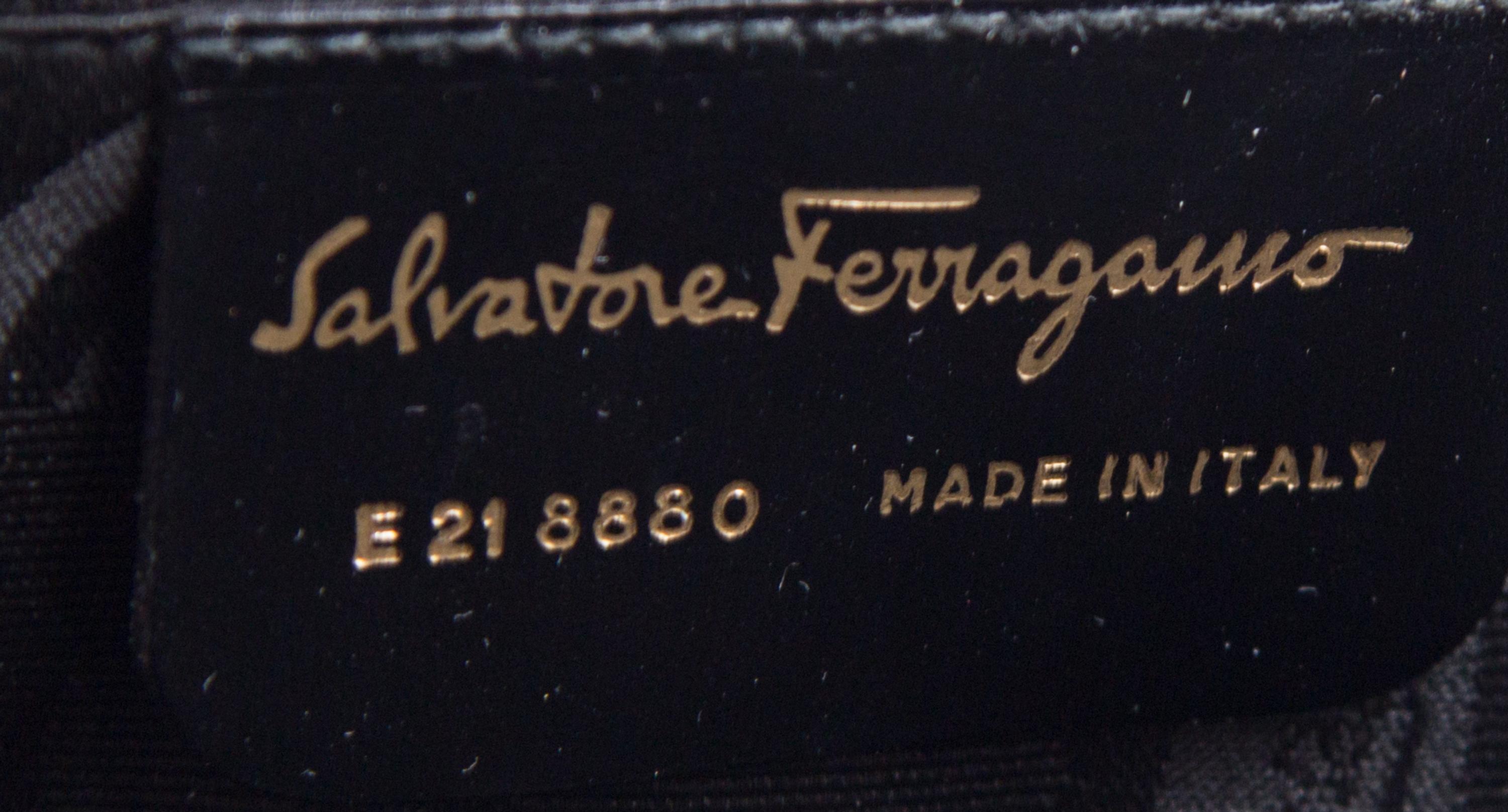 A Ferragamo Brown Leather Embossed Handbag, 10" x 9" x 3".