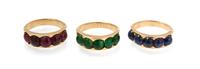 A Collection of Yellow Gold, Ruby, Emerald and Sapphire Stacking Rings, 9.50 dwts.
