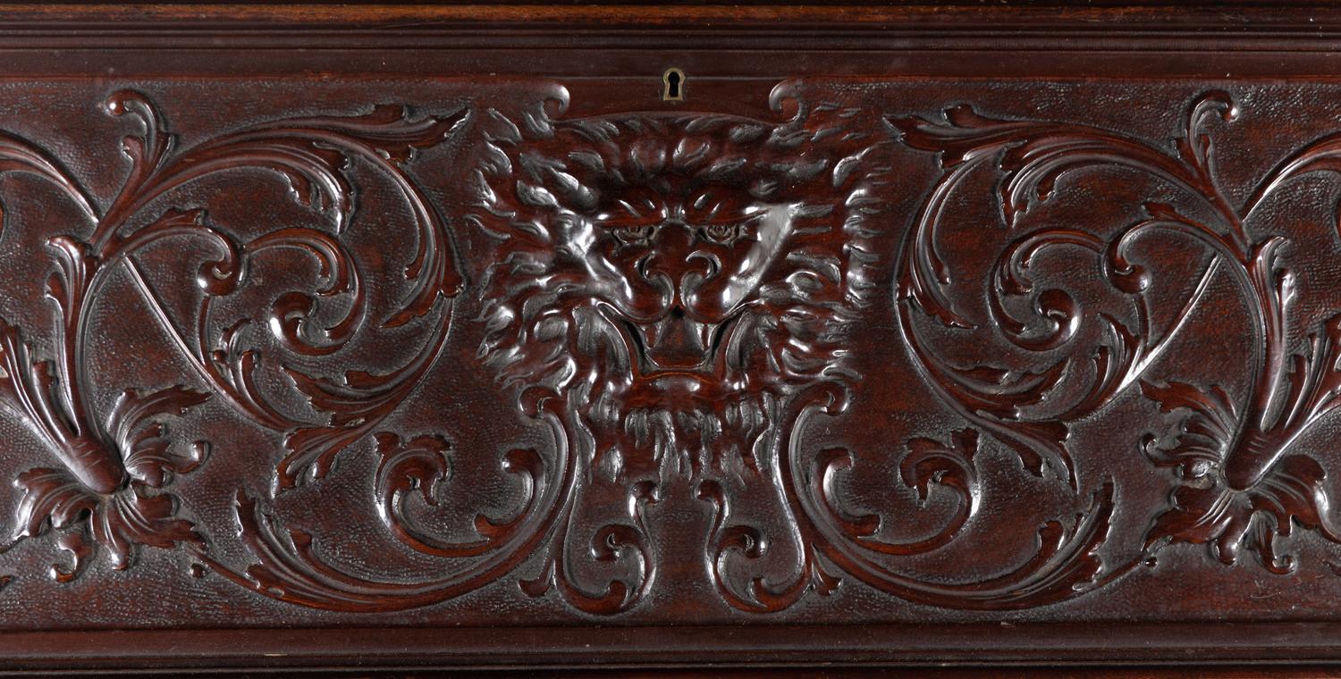 A Renaissance Revival Carved Mahogany Slant-Front Bureau