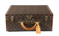 A Louis Vuitton Monogram Canvas Hardsided Suitcase, 17.5" x 14" x 7".