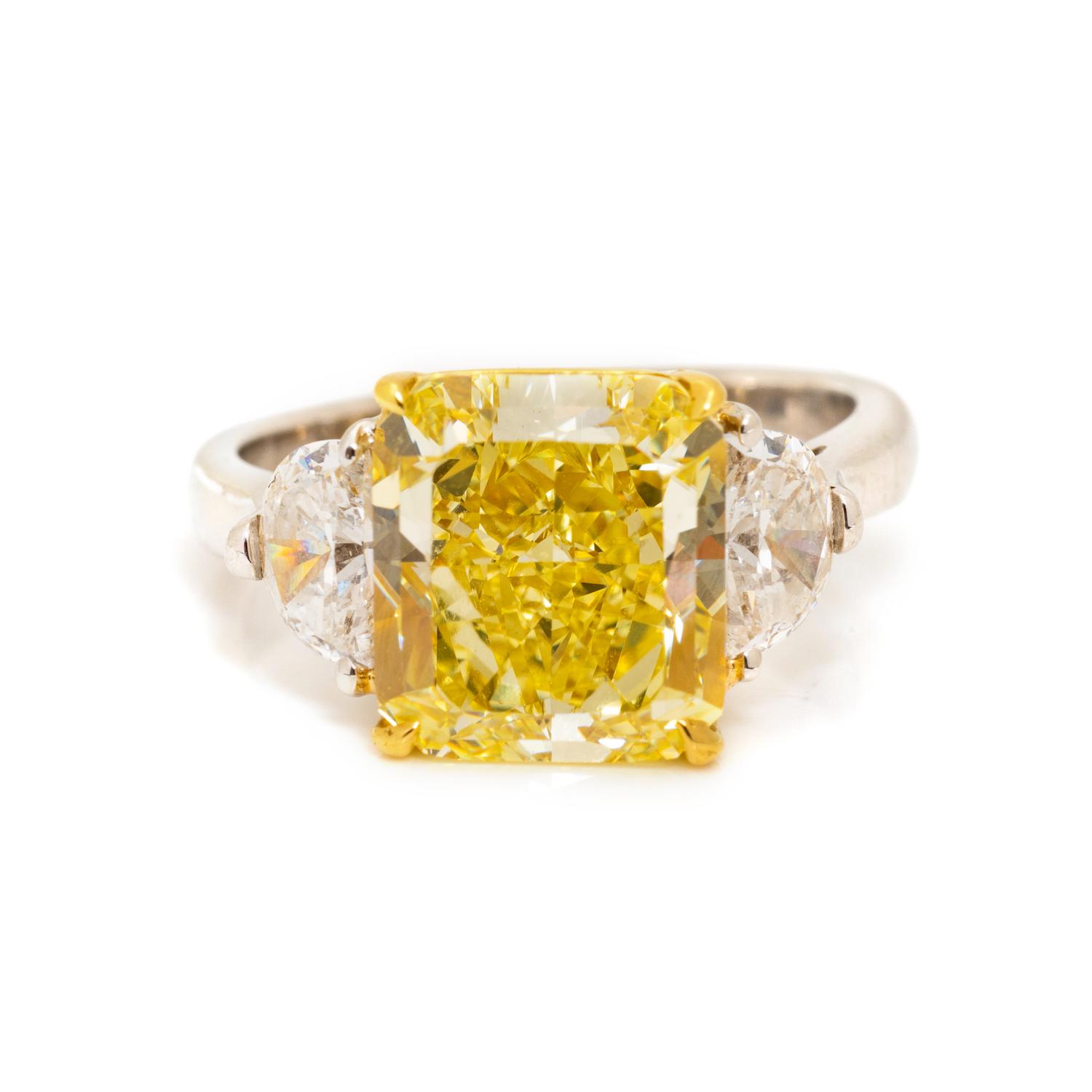 FANCY INTENSE YELLOW DIAMOND AND DIAMOND RING