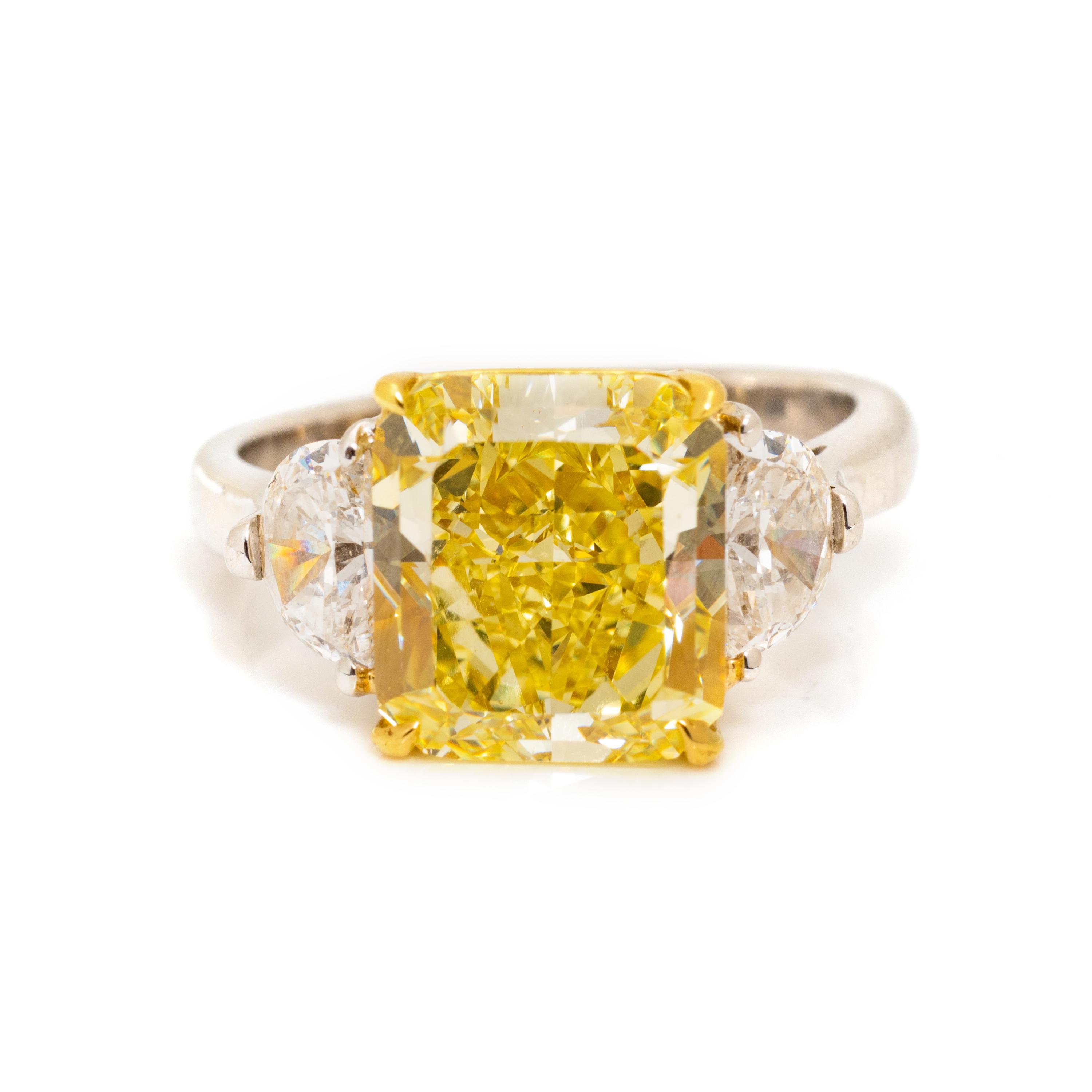 FANCY INTENSE YELLOW DIAMOND AND DIAMOND RING